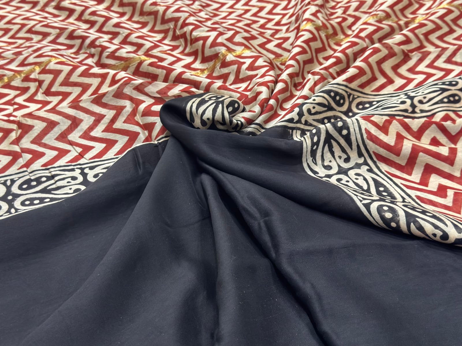 Deep Black with Rich Red and Ivory accents saree